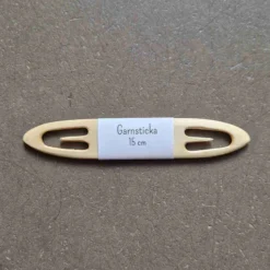 Garnsticka till bandvävning