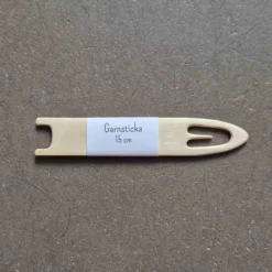 Garnsticka till bandvävning, öppen ände