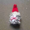 Pälstomte med paket